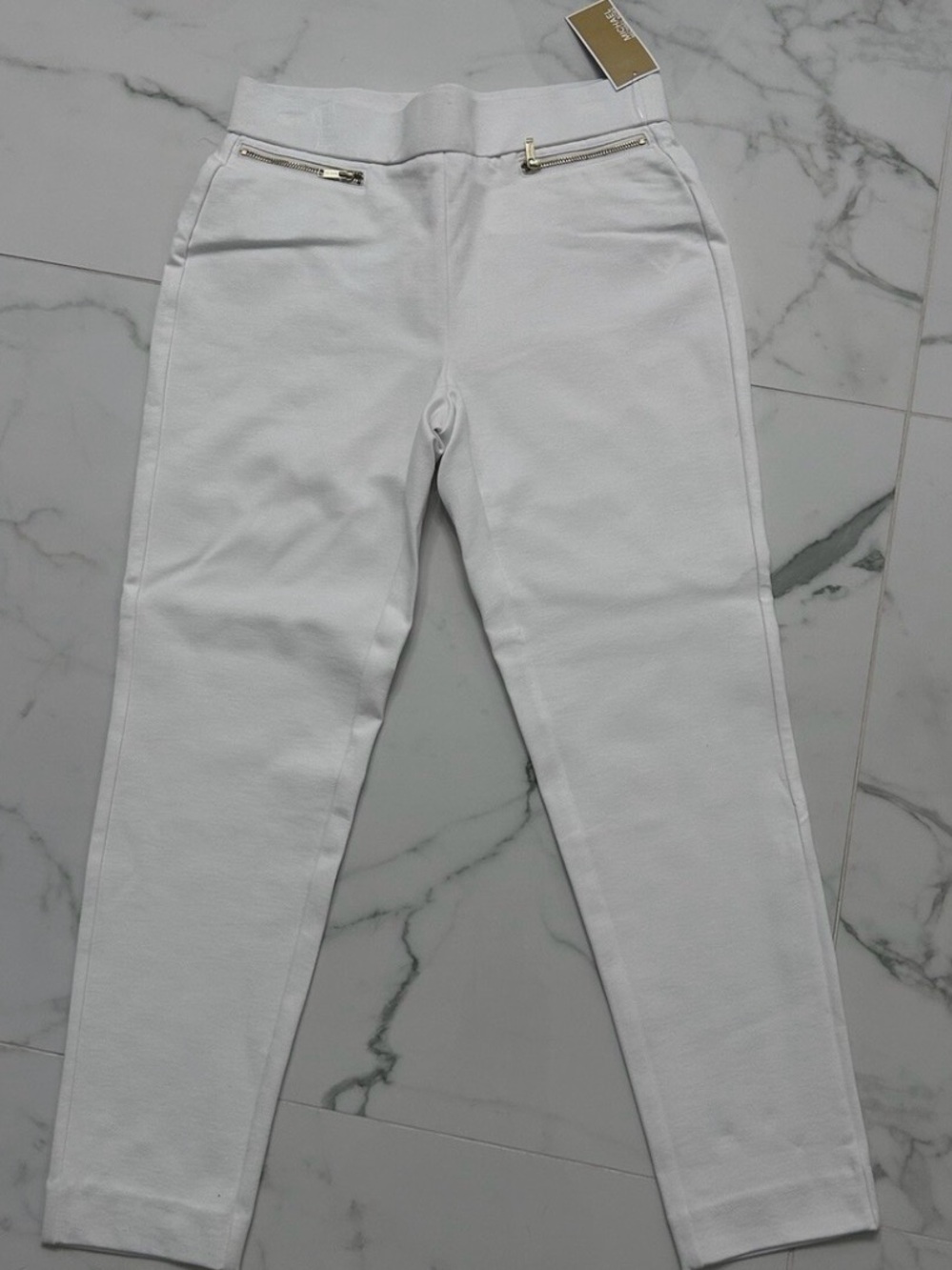 MICHAEL MICHAEL KORS White Pants With Gold Zippers.